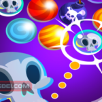 Image of a Halloween-themed Bubble Shooter game screen featuring colorful bubbles adorned with skull icons on a vibrant purple background. A cartoon skull character appears in the corner, aiming at the bubbles, adding a spooky and fun touch to the gameplay.