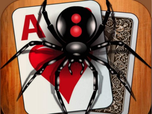 Image of a black spider perched on playing cards