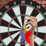 Image of a hand poised for action, ready to launch a dart at a captivating round target in the thrilling Darts 501 and More game.