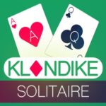 Image of Klondike Solitaire TLG: 2 cards on a vibrant green table, showcasing the essence of this captivating online card game.
