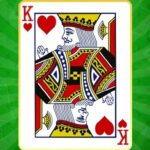 Image of a classic King playing card with a crown, ready to be dealt in the thrilling world of Solitaire King Game online. Unleash your inner card shark and reign supreme!