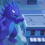 Image of a blue cartoon monster towering over city buildings at night, lifting its arm near a cracked rooftop as smoke rises from below.