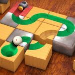 Image of the captivating Unblock The Ball game featuring a rolling ball navigating through intricate tile channels. Experience the thrill of puzzle-solving!