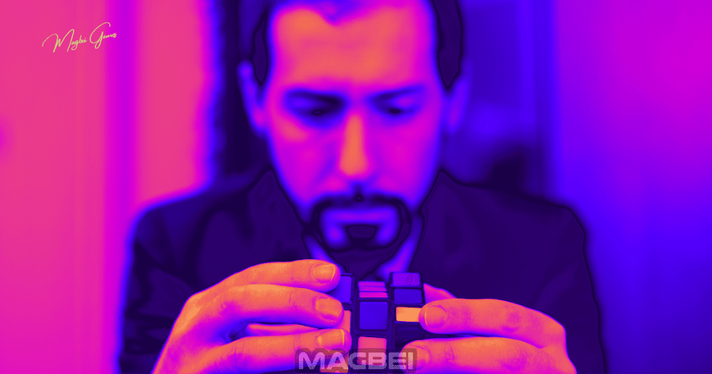 Image of a determined man with a goatee passionately engrossed in solving a Rubik's Cube. Depicting the addictive nature of puzzle games in the "20 Addictive Puzzle Games to Play Right Now" section of the online puzzle games article.