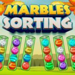 Image of vibrant fun: four glass tubes cradling a kaleidoscope of colored marble balls in the Marbles Sorting game.