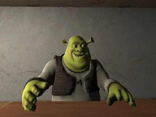 Image of Shrek, the iconic ogre from the DreamWorks animated film, looking up with a mischievous grin. He is wearing a brown vest and has his hands placed on a wooden table. The background suggests a dimly lit room with a grey wall. Shrek's expression hints at a playful or possibly sinister demeanor, leaving the viewer to wonder about his intentions in this particular scene.